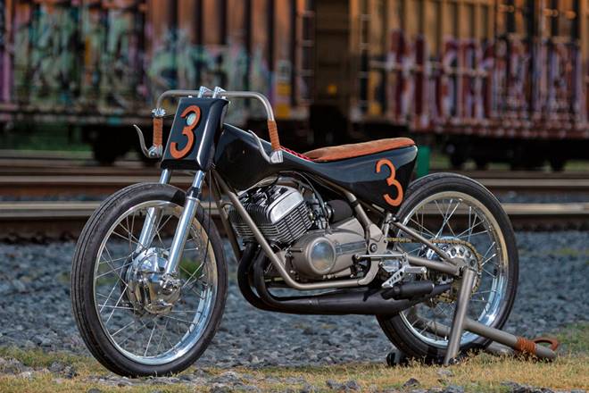 There is a certain charm to two-stroke motorcycles that a lot of people miss with their smell, sound and an unpredictable powerband. One of such people is Mark Miller a.k.a 'No Joke 2 Stroke' who is rather sentimental about two-strokes and gets his mojo running by custom-building one every 12 months. For his third project, Miller transformed a 1974 Yamaha RD350 into a Broadtracker-inspired fantasm.