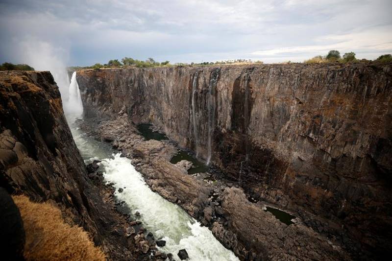 Victoria Falls, Victoria Falls in Zimbabwe, iconic Victoria Falls, largest waterfall, Victoria Falls images, Victoria Falls pictures
