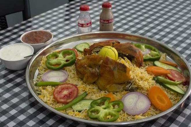 In a traditional society where social interactions often revolve around food, enormous displays of it connote affluence. (Representational Image: Reuters) In a traditional society where social interactions often revolve around food, enormous displays of it connote affluence. (Representational Image: Reuters)