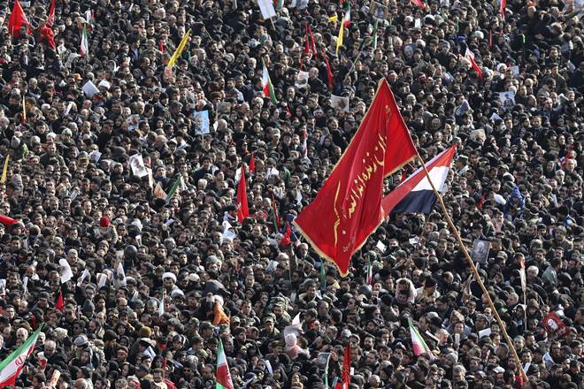 Mourners attend a funeral ceremony for Iranian Gen. Qassem Soleimani and his comrades, who were killed in Iraq in a U.S. drone strike on Friday, at the Enqelab-e-Eslami (Islamic Revolution) square in Tehran, Iran (AP Photo)