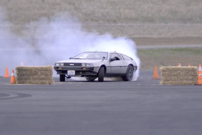 electric self driving delorean drifting