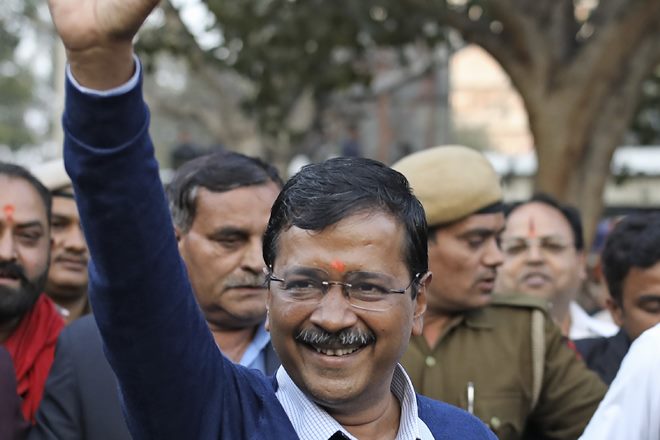At 3.35 pm, as he rose to speak, the slogan formed the backdrop of Arvind Kejriwal. (AP Photo)