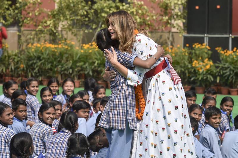 melania trump in india images, melania trump dress, melania trump fashion, melania trump dress images, melania trump india visit, delhi school, taj mahal, sabarmati ashram, motera stadium, namaste trump