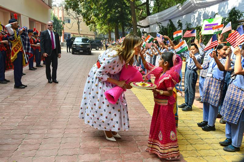 melania trump in india images, melania trump dress, melania trump fashion, melania trump dress images, melania trump india visit, delhi school, taj mahal, sabarmati ashram, motera stadium, namaste trump