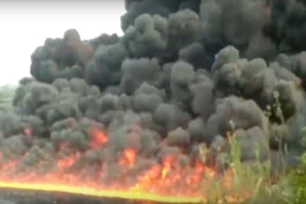 Water catches fire! Twitter wonders what caused massive inferno on Assam river; Watch video Water catches fire! Twitter wonders what caused massive inferno on Assam river; Watch video