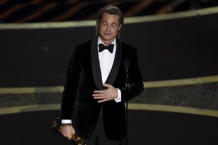 Brad Pitt accepts the award for best performance by an actor in a supporting role for "Once Upon a Time in Hollywood" at the Oscars on Sunday, Feb. 9, 2020, at the Dolby Theatre in Los Angeles. (AP Photo)