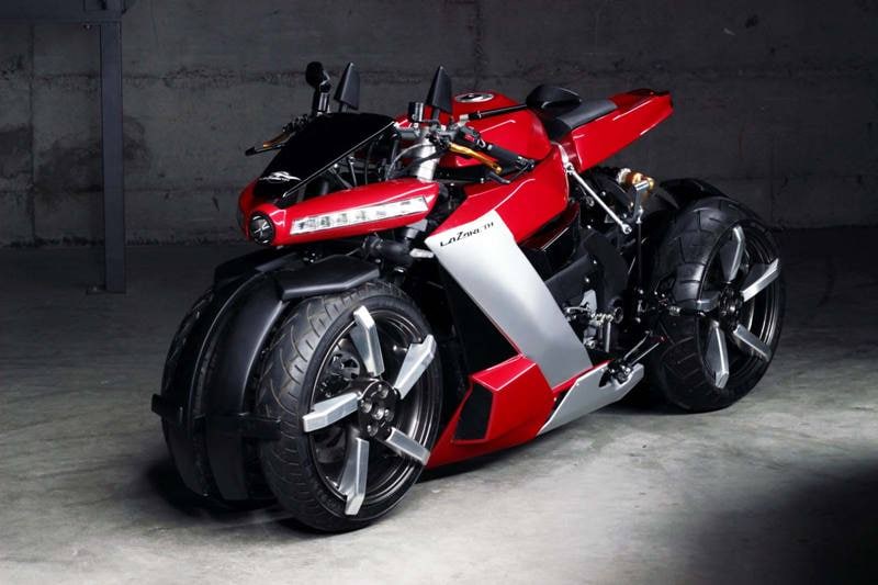 So, the four-wheel lean machine can stand upright on its own. But even with four wheels, it doesn't look very cluttered and quite frankly looks more practical than super wide car tyres on a bike (something like the ones we saw on the escape vehicle that broke off from Batman's Tumbler).
