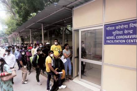 People with symptoms queue outside a Novel Coronavirus facilitation centre at RML Hospital in New Delhi (Express Photo) People with symptoms queue outside a Novel Coronavirus facilitation centre at RML Hospital in New Delhi (Express Photo)