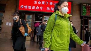 People are now allowed to travel in or out of Hubei as long as they have a "green" health code issued by authorities showing they are not infected by the virus which has claimed more than 3,200 lives in China.