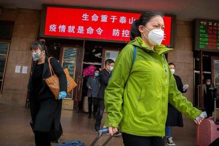 People are now allowed to travel in or out of Hubei as long as they have a "green" health code issued by authorities showing they are not infected by the virus which has claimed more than 3,200 lives in China.