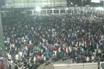 Amid COVID19 infection risk, thousands of migrant workers gather at Delhi bus stand to return home