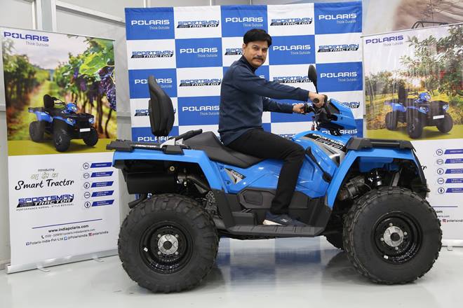 Mr. Pankaj Dubey, MD & Country Head, Polaris India with Polaris Sportsman 570 Tractor (1)