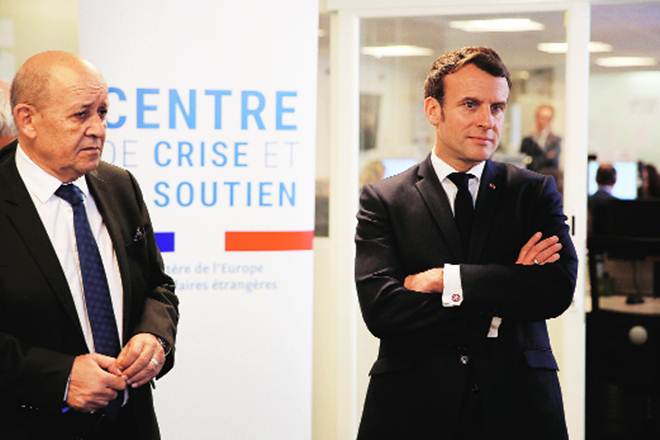French President Emmanuel Macron (right), French foreign minister Jean-Yves Le Drian at the Crisis & Support Centre, France (PTI)