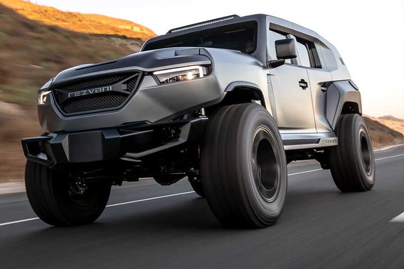 This apocalyptic SUV you see is actually a modified Jeep Wrangler underneath that has been beefed up, made into an Extreme Utility Vehicle (XUV) that you can actually buy. It is appropriately called the Rezvani Tank and there are two versions - a standard civilian version, and a beefed-up, bulletproof sophisticated military version.
