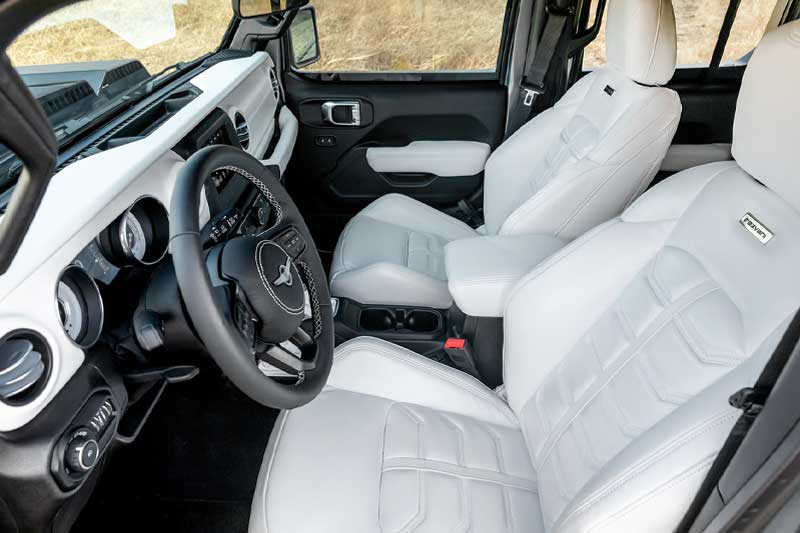 Should you like to drive in comfort during the apocalypse, then you would prefer to opt for the full leather package. This allows the interior of the vehicle to come with leather on the seats, interior door panels, instrument panel and centre console along with a suede headliner. You can also opt for the Automatic opening/closing side steps.