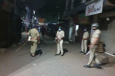 Migrant workers gathered in the Varachha area of Surat and squatted on a road to press for their demand to be sent back. Migrant workers gathered in the Varachha area of Surat and squatted on a road to press for their demand to be sent back.