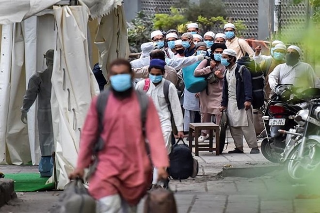 People who showed coronavirus symptoms being taken to various hospitals from Nizamuddin area in New Delhi, Monday, March 30, 2020. (PTI) People who showed coronavirus symptoms being taken to various hospitals from Nizamuddin area in New Delhi, Monday, March 30, 2020. (PTI)