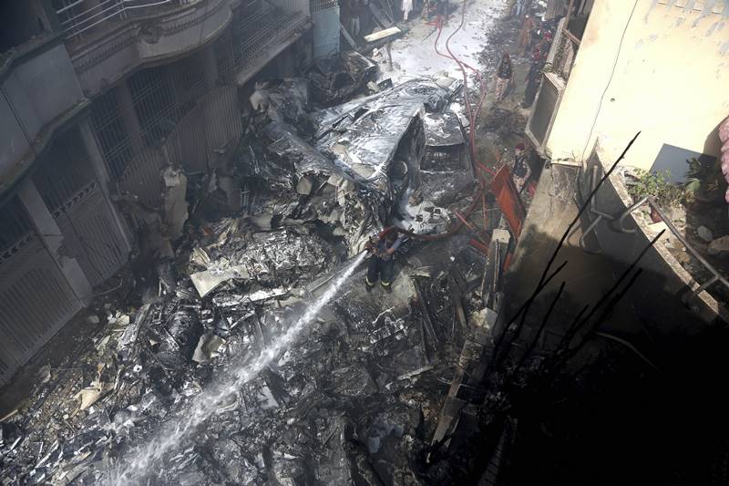 karachi air crash, karachi crash, Karachi air crash images, pakistan air crash images, pakistan plane crash images, PIA flight crash, pakistan plane crash, pakistan news, karachi airport crash latest news, pakistan air crash death toll, karachi, PIA crash news updates