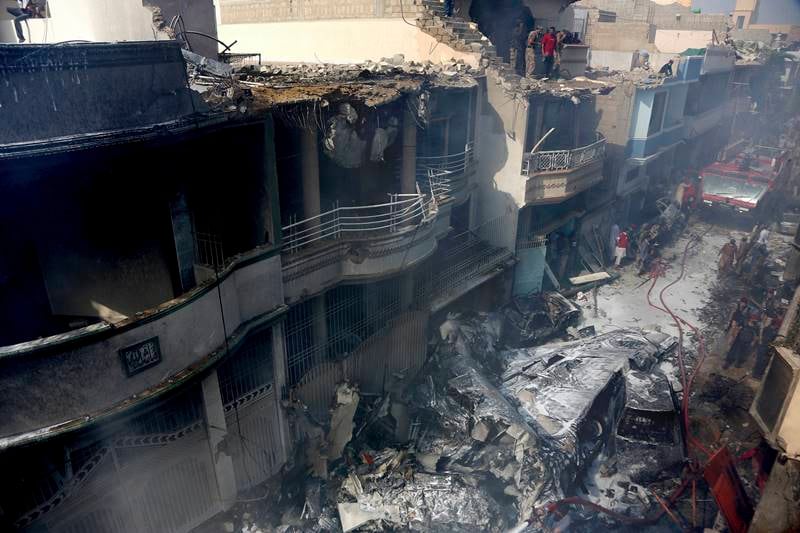 karachi air crash, karachi crash, Karachi air crash images, pakistan air crash images, pakistan plane crash images, PIA flight crash, pakistan plane crash, pakistan news, karachi airport crash latest news, pakistan air crash death toll, karachi, PIA crash news updates