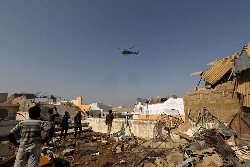 karachi air crash, karachi crash, Karachi air crash images, pakistan air crash images, pakistan plane crash images, PIA flight crash, pakistan plane crash, pakistan news, karachi airport crash latest news, pakistan air crash death toll, karachi, PIA crash news updates
