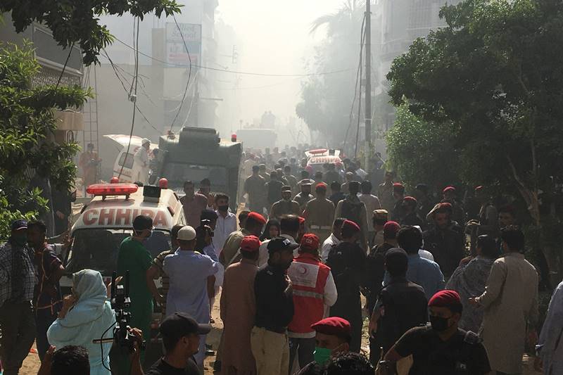 karachi air crash, karachi crash, Karachi air crash images, pakistan air crash images, pakistan plane crash images, PIA flight crash, pakistan plane crash, pakistan news, karachi airport crash latest news, pakistan air crash death toll, karachi, PIA crash news updates