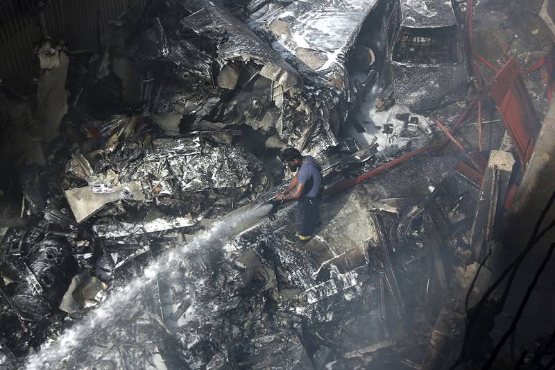 karachi air crash, karachi crash, Karachi air crash images, pakistan air crash images, pakistan plane crash images, PIA flight crash, pakistan plane crash, pakistan news, karachi airport crash latest news, pakistan air crash death toll, karachi, PIA crash news updates