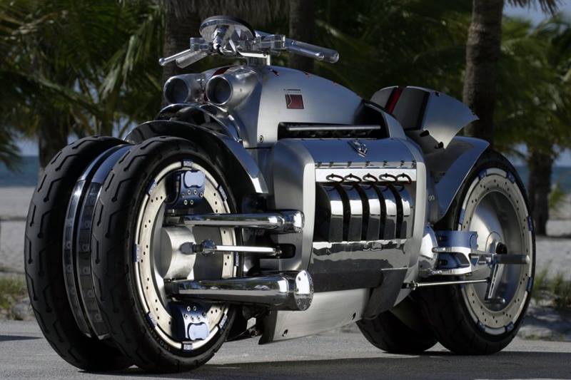 Dodge Tomahawk: No, motorcycles with car engines can not be spoken of without the mention of the Tomahawk. It grew ever so popular for its massive 8.3-litre V10 engine, its four wheels along with leaning capability and a promise of 500 bhp. Dodge did offer about 10 of these for sale but the original concept was the only one that was ever built. This may have something to do with the price tag that stood at $5,55,000 (approximately Rs 4.2 crore). And on top of that, we reckon if you were looking for performance and had that kind of money, you could buy a Kawasaki H2R or a BMW HP4 Race or even a Ducati Superleggera V4 at a fraction of the Tomahawk's price.
