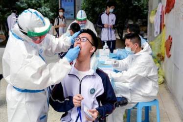 China reports 23 fresh COVID-19 cases including 1 in Wuhan