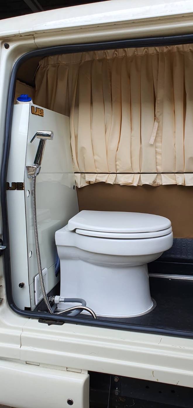 This Mahindra Bolero with a portable toilet will put many expensive vanity vans to shame