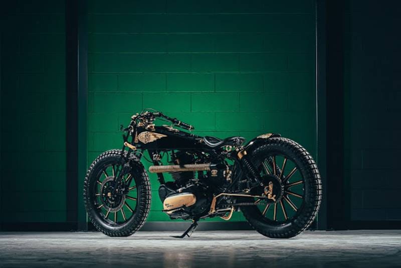 A 2008 Royal Enfield 500 Bullet boardtracker with steampunk style, but it looks as though it belongs to the early 1900s. "My goal is always to create something never seen on the specific model I'm working on. I wanted to give it more lightness and a classic years appearance, where the man/machine symbiosis was one."