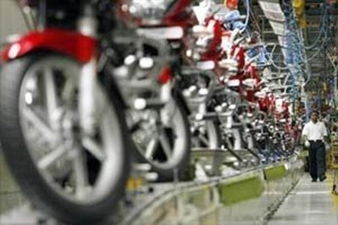 Bajaj Auto share price gains despite Q1 profit falling by half; should you buy or sell? Check target price