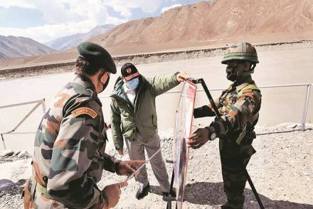 In this photo provided by the Press Information Bureau, Indian Prime Minister Narendra Modi interacts with soldiers during a visit to the Ladakh area, India, Friday, July 3, 2020. Modi made an unannounced visit Friday to a military base in remote Ladakh region bordering China where the soldiers of the two countries have been facing off for nearly two months. Modi’s visit comes in the backdrop of massive Indian army build-up in Ladakh region following hand-to-hand combat between Indian and Chinese soldiers on June 15 that left 20 Indian soldiers dead and dozens injured, the worst military confrontation in over four decades between the Asian giants. (Press Information Bureau via AP)