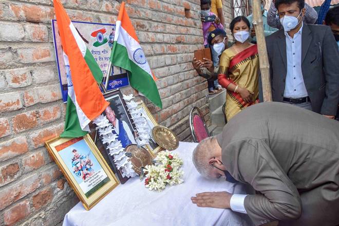 Birbhum: West Bengal Governor Jagdeep Dhankhar pays tribute to martyr Rajesh Orang, at Belgoria village in Birbhum district, Friday, July 17, 2020. Orang was among the twenty Indian Army soldiers who were martyred during a face-off with Chinese troops in Ladakh's Galwan Valley recently. (PTI Photo)(PTI17-07-2020_000116B) Birbhum: West Bengal Governor Jagdeep Dhankhar pays tribute to martyr Rajesh Orang, at Belgoria village in Birbhum district, Friday, July 17, 2020. Orang was among the twenty Indian Army soldiers who were martyred during a face-off with Chinese troops in Ladakh's Galwan Valley recently. (PTI Photo)(PTI17-07-2020_000116B)