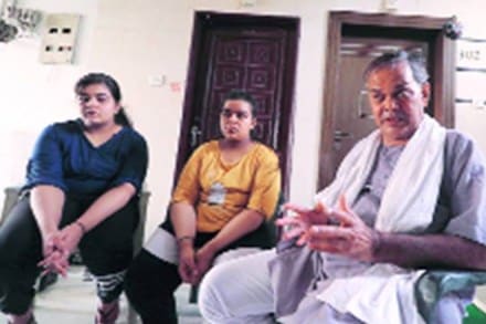 Dy SP Devendra Kumar Mishra’s daughters, Vaishardi and Vaishnavi, with a relative. (Express Photo by Vishal Srivastav)