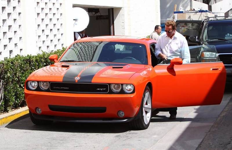 You can't be American without any love for muscle cars and Arnold's is depicted through his Dodge Challenger SRT8 which packs 470 hp from its 6.4-litre V8 engine. (Photo: Zimbo)