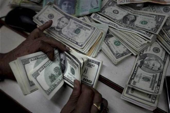 India’s forex reserves hit record high of $516 billion
