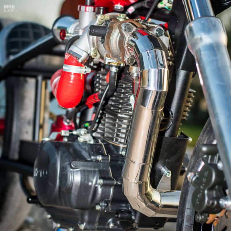 It may still not be a 10-second quarter mile muncher, but it is the most extreme modification on an Xtreme we've ever seen. The boys tweaked the frame for strength, gave it a hardtail rear end, fitted a turbocharger, custom-built the exhaust, and added a streamliner. (Source: Bikeexif)