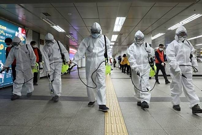 China's northwestern region of Xinjiang has 26 new cases as authorities continue to fight to curb an outbreak through travel restrictions and the lockdown of some residential areas.