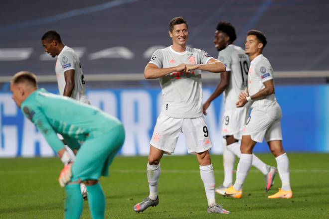 Soccer Football - Champions League - Quarter Final - FC Barcelona v Bayern Munich - Estadio da Luz, Lisbon, Portugal - August 14, 2020 Bayern Munich's Robert Lewandowski celebrates scoring their sixth goal, as play resumes behind closed doors following the outbreak of the coronavirus disease (COVID-19) Manu Fernandez/Pool via REUTERS TPX IMAGES OF THE DAY Soccer Football - Champions League - Quarter Final - FC Barcelona v Bayern Munich - Estadio da Luz, Lisbon, Portugal - August 14, 2020 Bayern Munich's Robert Lewandowski celebrates scoring their sixth goal, as play resumes behind closed doors following the outbreak of the coronavirus disease (COVID-19) Manu Fernandez/Pool via REUTERS TPX IMAGES OF THE DAY