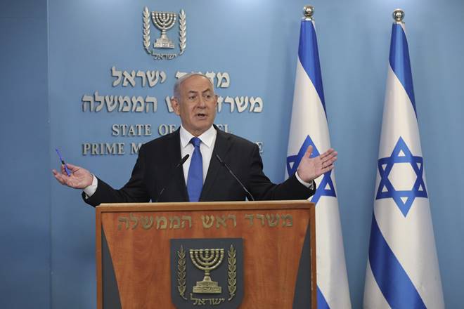 FILE - In this Thursday, Aug. 13, 2020 file photo, Israeli Prime Minister Benjamin Netanyahu announces that full diplomatic ties will be established with the United Arab Emirates in a U.S.-brokered deal, during a news conference, in Jerusalem. Netanyahu said Sunday, Aug. 16, 2020, that a deal to establish full diplomatic ties with the United Arab Emirates proves that Israel doesn’t need to retreat from occupied land demanded by the Palestinians to achieve peace and normalization with Arab states. (Abir Sultan/Pool Photo via AP, File)