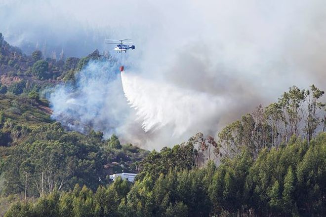 Overall, the fires have killed five people, torched nearly 700 homes and other structures. Overall, the fires have killed five people, torched nearly 700 homes and other structures.