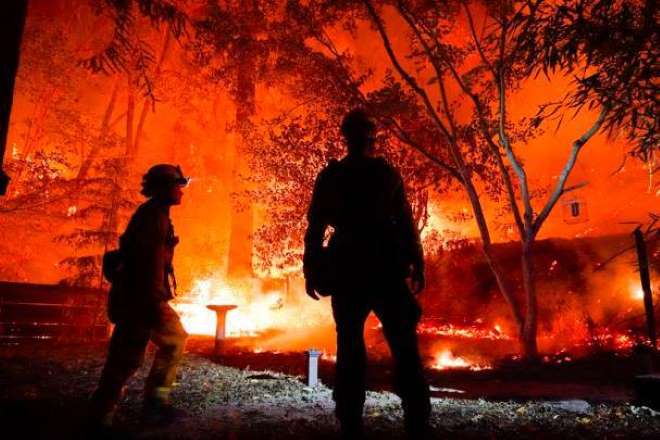 The fires have killed five people and torched nearly 700 homes. The fires have killed five people and torched nearly 700 homes.