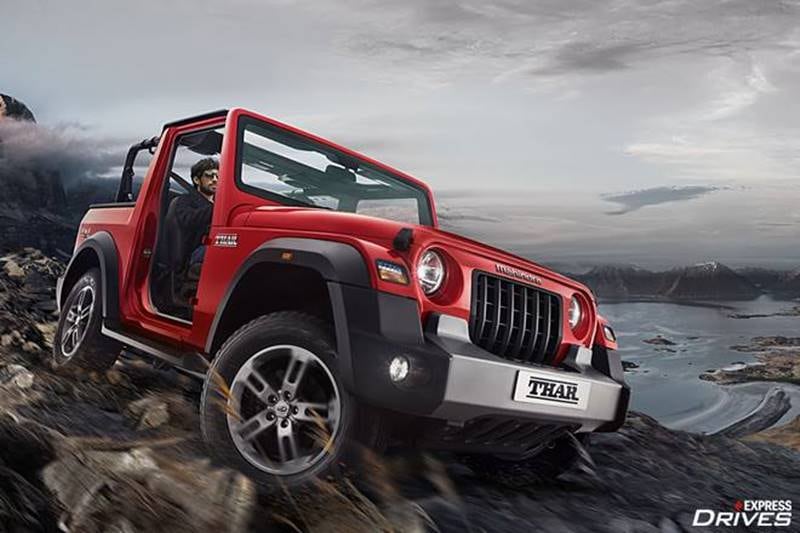 The all-new 2020 Mahindra Thar has been finally revealed and the company chose Indian Independence Day for the unveiling of its highly-awaited off-roader. The new second-generation Thar gets a familiar silhouette and aims to take the legacy of the iconic SUV forward. Now that the 2020 Mahindra Thar is no mystery and has been unwrapped before the world, let's take a look at what all it gets and how long you will have to wait to buy one!