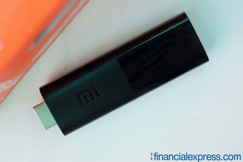 The Mi TV Stick is a slick-looking dongle, which has visibly more compact dimensions than the Amazon Fire TV Stick. The device has a dual tone finish and it comes in black. One half of it has a smooth matte finish while the other half is glossy. Unlike the Fire TV Stick's minimalist design, the Mi TV Stick is more attractive to look at and quite distinct too. (Photo credit: Saurabh Singh/Financial Express)