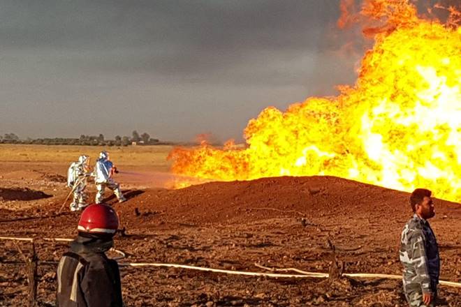 Firefighters spray water on the fire that resulted from an explosion on the Arab Gas Pipeline between the towns of Ad Dumayr and Adra, northwest of the capital of Damascus, Syria, in this handout released by SANA on August 24, 2020. SANA/Handout via REUTERS ATTENTION EDITORS - THIS IMAGE WAS PROVIDED BY A THIRD PARTY. REUTERS IS UNABLE TO INDEPENDENTLY VERIFY THIS IMAGE. Firefighters spray water on the fire that resulted from an explosion on the Arab Gas Pipeline between the towns of Ad Dumayr and Adra, northwest of the capital of Damascus, Syria, in this handout released by SANA on August 24, 2020. SANA/Handout via REUTERS ATTENTION EDITORS - THIS IMAGE WAS PROVIDED BY A THIRD PARTY. REUTERS IS UNABLE TO INDEPENDENTLY VERIFY THIS IMAGE.