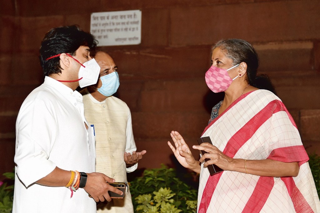Finance Minister Nirmala Sitharaman (right) and BJP Rajya Sabha MP Jyotiraditya Scindia (left) at Parliament House on the opening day of Monsoon Session, in New Delhi (Image:PTI) Finance Minister Nirmala Sitharaman (right) and BJP Rajya Sabha MP Jyotiraditya Scindia (left) at Parliament House on the opening day of Monsoon Session, in New Delhi (Image:PTI)