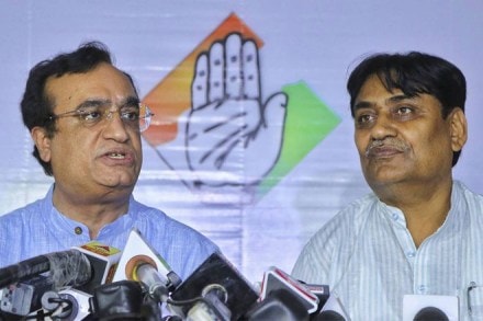 Congress leader Ajay Maken speaks to the media as Rajasthan Congress president Govind Singh Dotasra looks on, in Jaipur on Monday. (PTI photo)