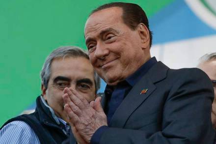 FILE - In this Oct. 19, 2019 file photo, Silvio Berlusconi addresses a rally in Rome. Italy’s former prime minister and right-wing leader Silvio Berlusconi has tested positive to coronavirus after a precautionary check, his press office said on Wednesday, Sept. 2, 2020. The three-time-premier and media tycoon had been recently seen with his old-time friend and businessman Flavio Briatore, who was recently hospitalized after testing positive to Covid-19 last month. Berlusconi had tested negative at the time. (AP Photo/Andrew Medichini) FILE - In this Oct. 19, 2019 file photo, Silvio Berlusconi addresses a rally in Rome. Italy’s former prime minister and right-wing leader Silvio Berlusconi has tested positive to coronavirus after a precautionary check, his press office said on Wednesday, Sept. 2, 2020. The three-time-premier and media tycoon had been recently seen with his old-time friend and businessman Flavio Briatore, who was recently hospitalized after testing positive to Covid-19 last month. Berlusconi had tested negative at the time. (AP Photo/Andrew Medichini)