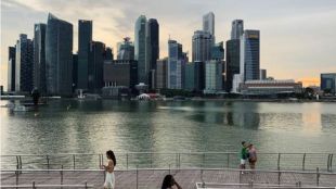 There are a few ways in which the Republic can stay open and yet "develop Singaporeans to the most", said Tharman.