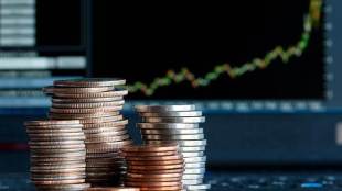 The dollar rose to 106.29 Japanese yen from Friday's 106.21 yen.